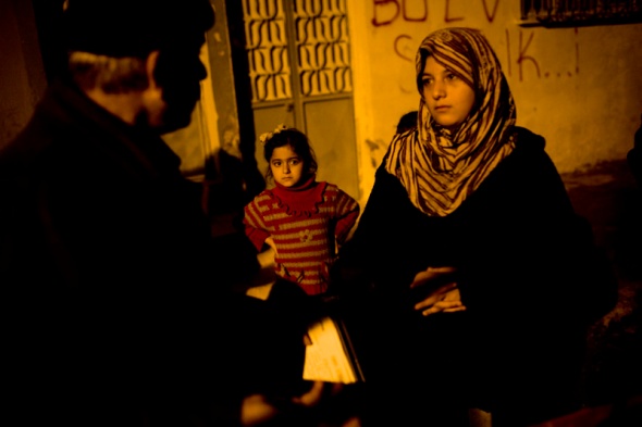 Emergency relief is distributed to Syrian refugees in the Turkis